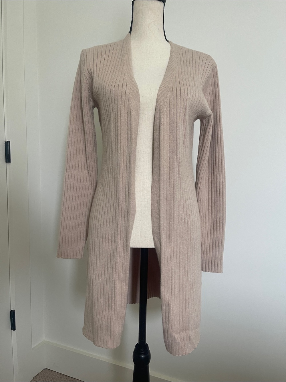 Taupe ribbed open front cardigan with button detail on the sides.